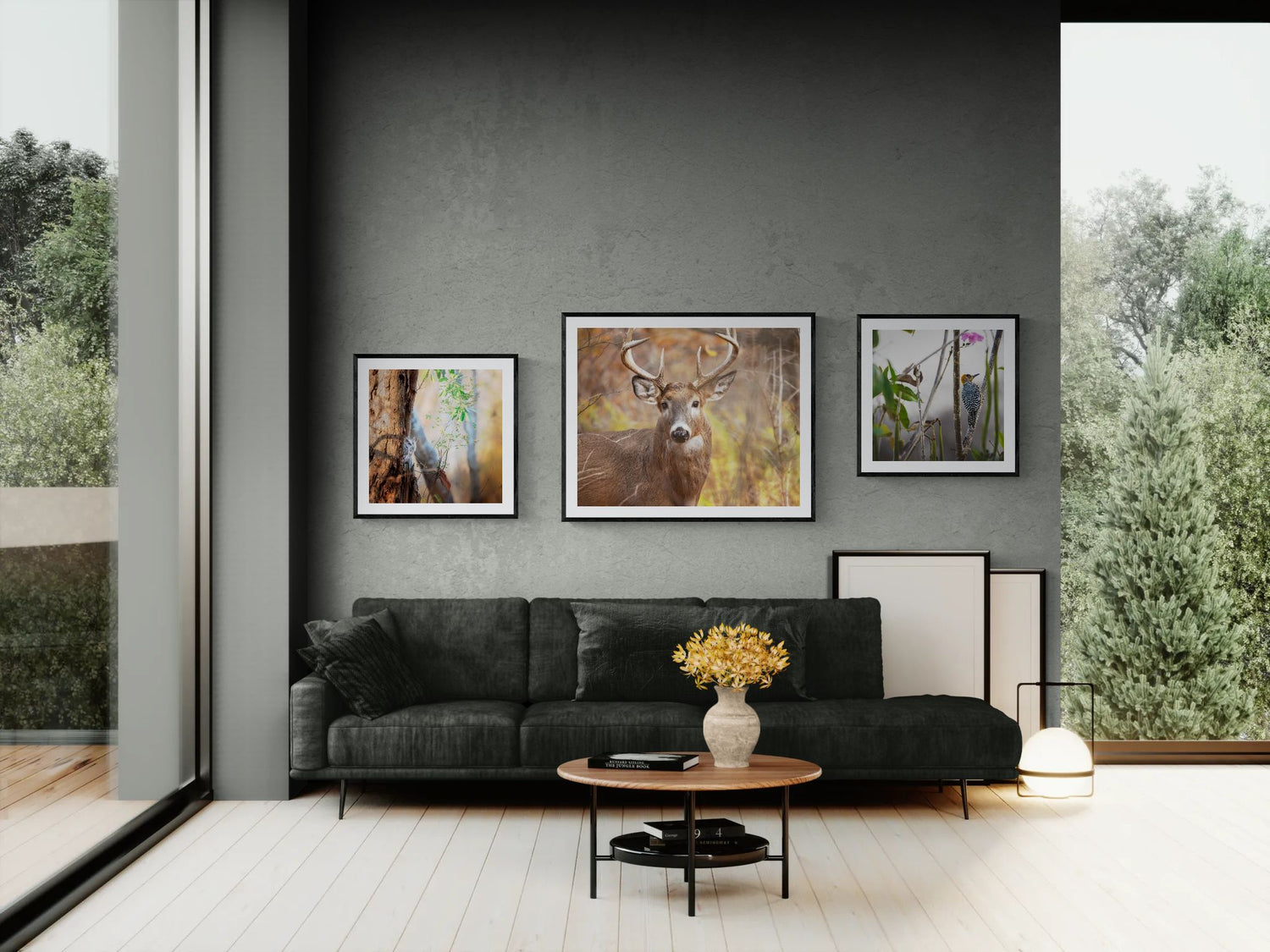 Modern living room with a gray sofa, decorative pillows, and wildlenz wall art gallery.