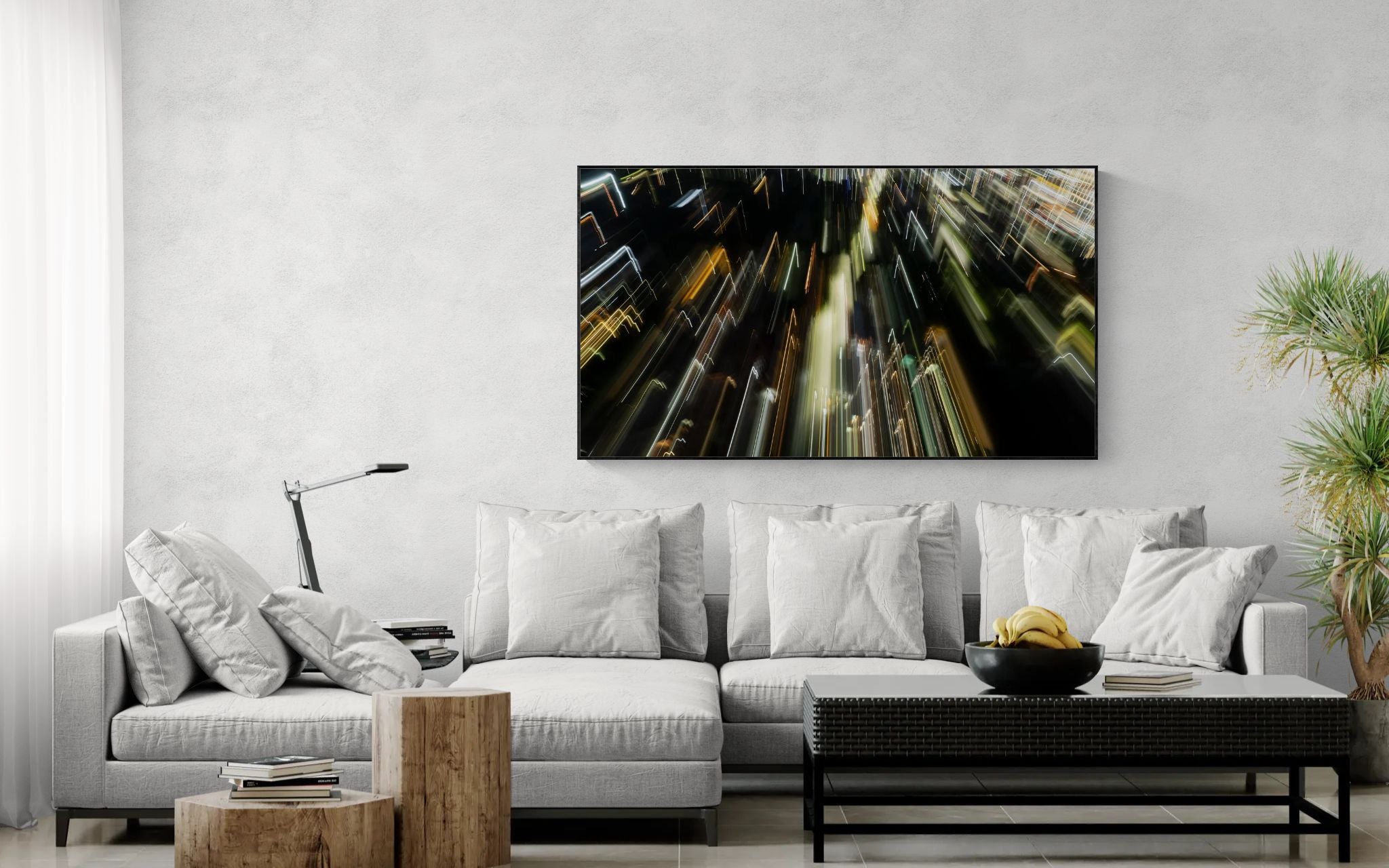 Modern living room with a white sofa, decorative pillows, and a large abstract acrylic art piece on the wall.