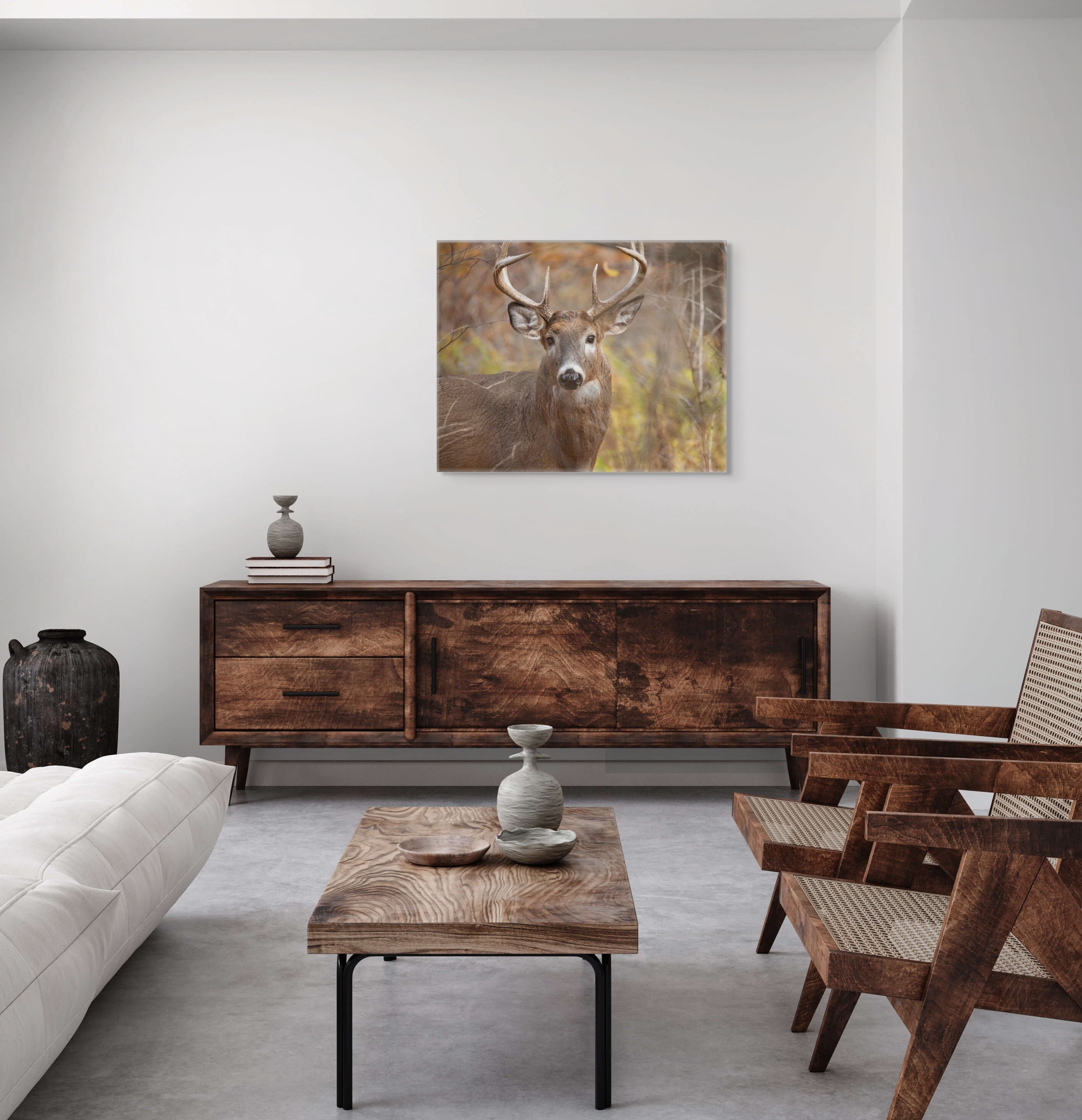 Modern living room with wooden furniture and a deer canvas on the wall.
