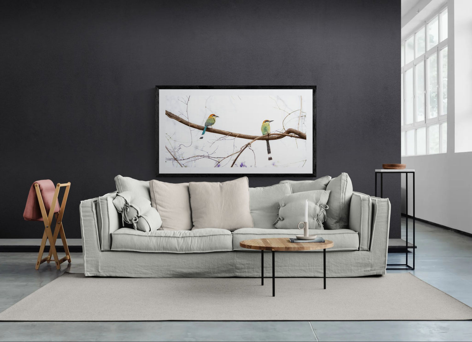 Open-plan industrial living room with a large fine art print of wildlenz twin motmot, as a focal wall piece.
